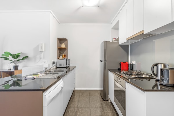 Foto van Luxe 2-slaapkamerapp met rivierzicht, bij casino - Vakantiehuis in Southbank - Kitchen