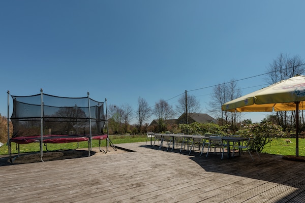 Foto van Comfortabel huis in de buurt van het bos met sauna - GardenSummer