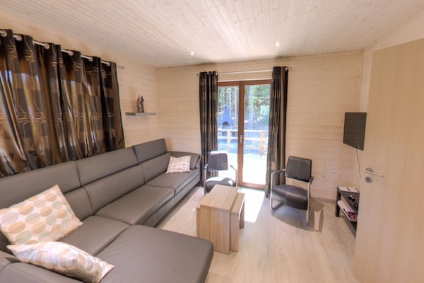 Foto van Luxe chalet met sauna in het bos nabij Durbuy - Vakantiehuis in Barvaux - LivingRoom