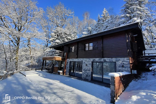 Foto van Chalet in het bos met Nordic bad - Vakantiehuis in Manhay - ExteriorSummer