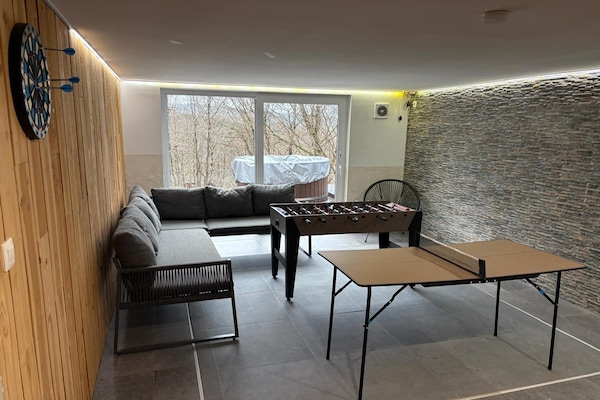 Foto van Chalet in het bos met Nordic bad - Vakantiehuis in Manhay - ExteriorSummer