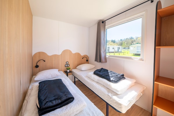 Foto van Luxe caravan in Érezée met terras - Vakantiehuis in Érezée - BedRoom