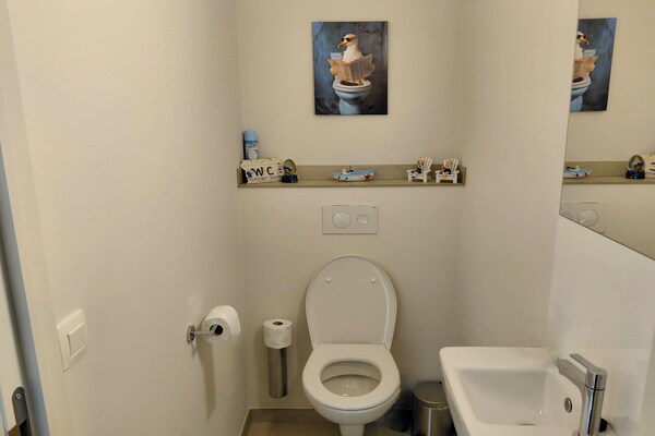 Foto van Luxe appartement met zwembad & parking - Vakantiehuis in Nieuwpoort - BathRoom