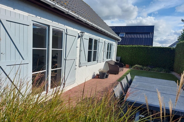 Foto van Gezellig Vakantiehuis in Nieuwpoort met zwembad in de zomer - GardenSummer