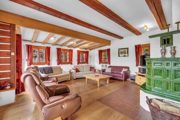 Foto van Villa in Tsjechië met Zwembad en Uitzicht - Vakantiehuis in Vidochov - LivingRoom