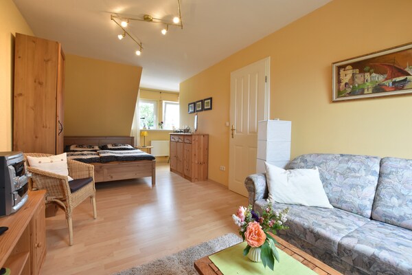 Foto van Mooi appartement in Am Salzhaff met open haard - Vakantiehuis in Rakow Mecklenburg - LivingRoom