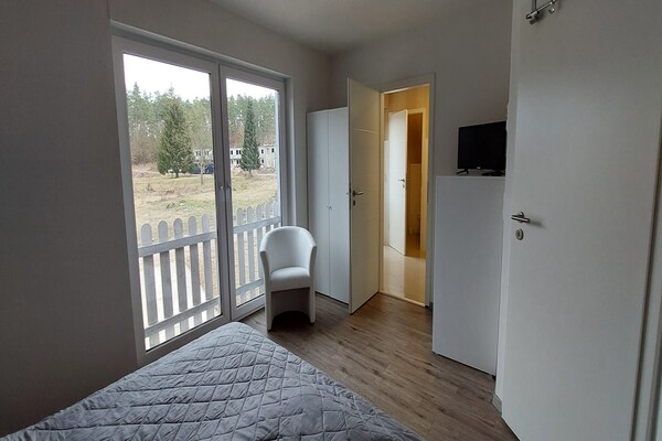 Foto van Vakantieappartement met uitzicht op het meer aan de Groß Labenzer See - BedRoom