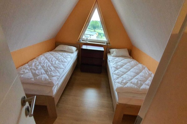 Foto van Vakantieappartement met uitzicht op het meer aan de Groß Labenzer See - BedRoom