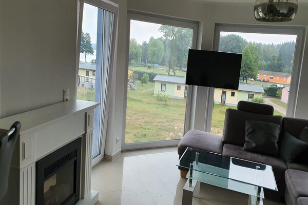 Foto van Vakantieappartement met uitzicht op het meer aan de Groß Labenzer See - LivingRoom