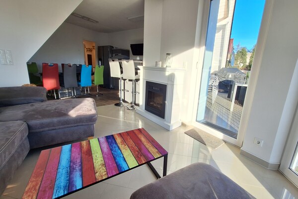 Foto van Vakantieappartement met uitzicht op het meer aan de Groß Labenzer See - LivingRoom