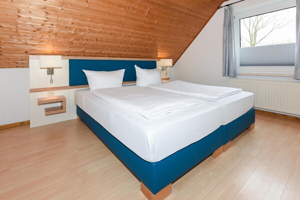Foto van Groot vakantieappartement op de zolder, Bensersiel - BedRoom