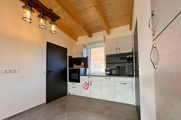 Foto van Vakantieappartement met eigen toegang tot het meer en een aanlegsteiger. - Kitchen