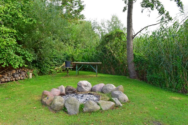 Foto van Vakantieappartement met eigen toegang tot het meer en een aanlegsteiger. - GardenSummer