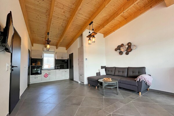 Foto van Vakantieappartement met eigen toegang tot het meer en een aanlegsteiger. - Kitchen
