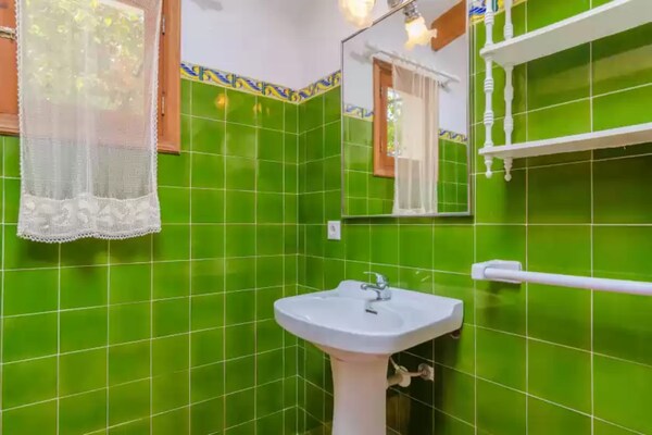 Foto van Villa in Sant Elm met Zwembad & Strand - Vakantiehuis in Sant Elm (andratx), Illes Balears - BathRoom