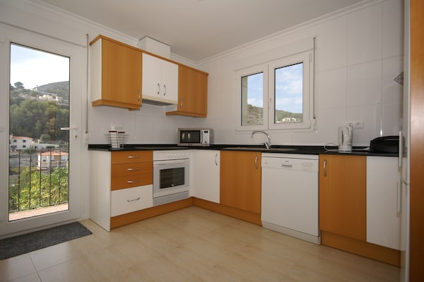 Foto van Vakantiehuis Alcalalí met zwembad en uitzicht - Vakantiehuis in Alcalali - Kitchen