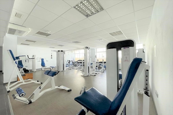 Foto van Strandappartement in Roquetas de Mar - Vakantiehuis in Roquetas de Mar - gym
