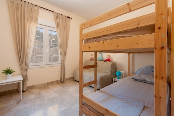 Foto van 3-slaapkamerappartement met privétuin - Vakantiehuis in Pinos de Alhaurín - BedRoom