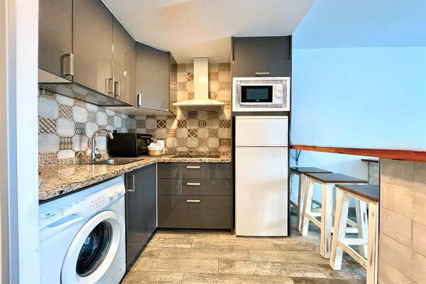 Foto van Appartement aan het strand met terras - Vakantiehuis in Benalmádena - Kitchen