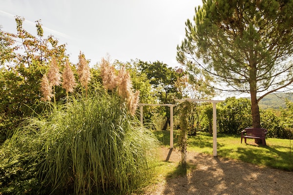 Foto van Historische torenwoning in Brignac - Vakantiehuis in Brignac-la-Plaine - GardenSummer