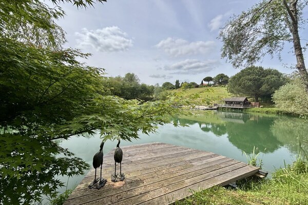 Foto van De stoel en het zwembad bij Sarlat - Vakantiehuis in Veyrines-de-Domme - Untagged