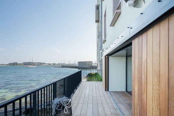 Foto van Appartement in Landéda met uitzicht op het strand - TerraceBalcony