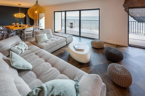 Foto van Appartement in Landéda met uitzicht op het strand - LivingRoom
