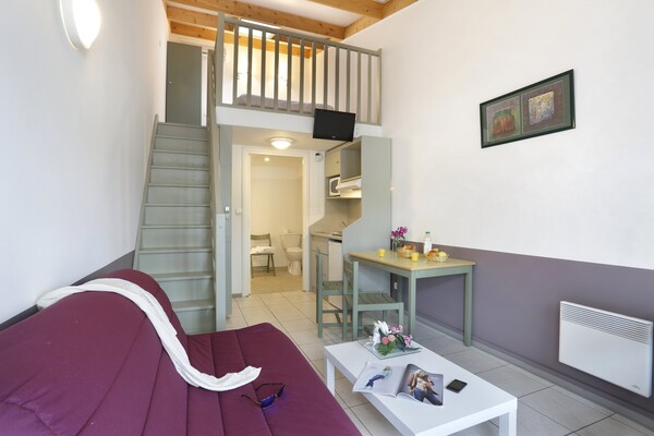 Foto van Groot verblijf met mezzanine voor 6 personen in Merville - LivingRoom