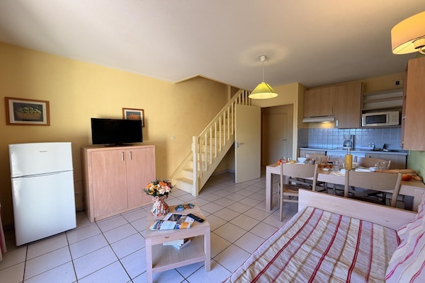 Foto van Duplexappartement met zeezicht voor 8 - Vakantiehuis in Cerbère - LivingRoom
