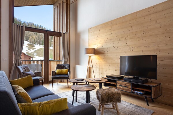 Foto van Chalet in Paradiski met ski-in/ski-out toegang - Vakantiehuis in Macot La Plagne - LivingRoom