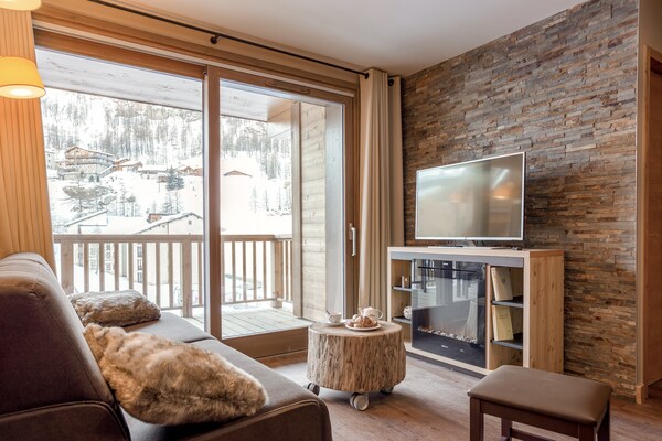 Foto van Chalet Appartement met Zwembad - Vakantiehuis in Tignes 1800 - LivingRoom