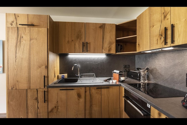 Foto van Appartement in Samoëns met Spa en Zwembad - Vakantiehuis in Samoëns - Kitchen