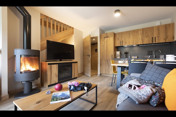 Foto van Appartement in Samoëns met Spa en Zwembad - Vakantiehuis in Samoëns - LivingRoom