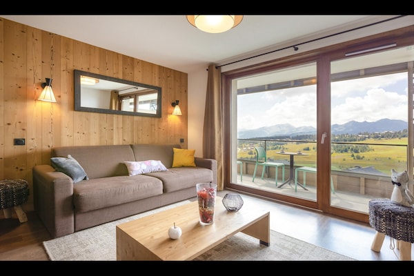 Foto van Appartement in Hauteluce met Ski-In/Ski-Out - Vakantiehuis in Hauteluce - LivingRoom