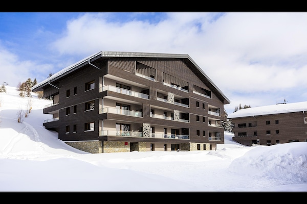 Foto van Appartement in Hauteluce met Ski-In/Ski-Out - Vakantiehuis in Hauteluce - ExteriorWinter