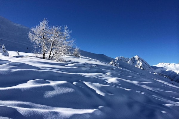 Foto van Ontspannend appartement aan het zwembad in de Alpen - AreaWinter5KM