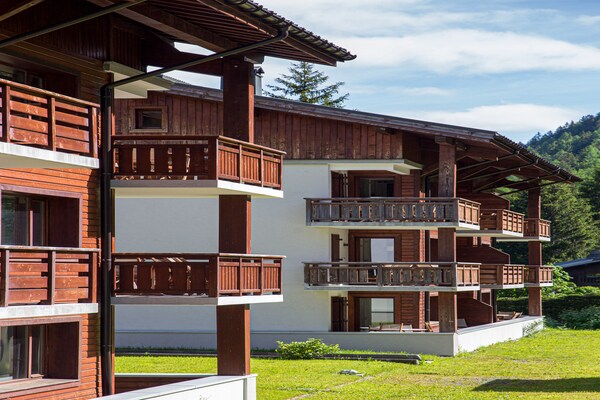 Foto van Ontspannend appartement aan het zwembad in de Alpen - TerraceBalcony