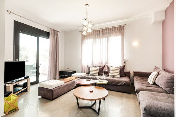 Foto van Villa op Kreta met Uitzicht op Zee - Vakantiehuis in Adelianos Kampos - LivingRoom