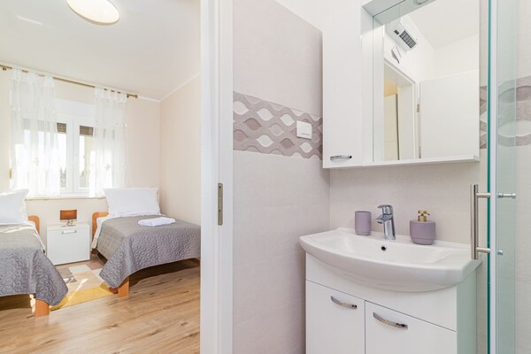 Foto van Appartement in Medulin bij Bijeca Strand - Vakantiehuis in Medulin - BathRoom