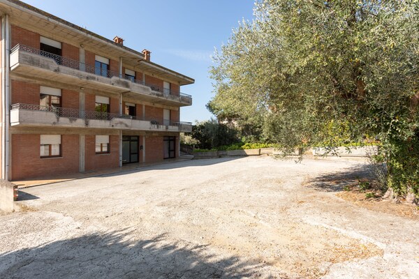 Foto van Appartement in Toscane bij Trasimeno - Vakantiehuis in Tuoro sul Trasimeno - ExteriorSummer