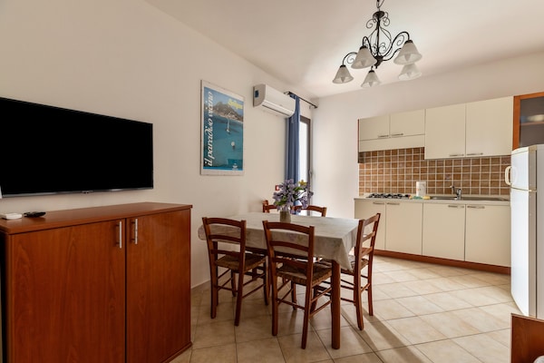 Foto van Een merrie van 150 meter, 2, aria condizionata - Vakantiehuis in Valledoria - DiningRoom