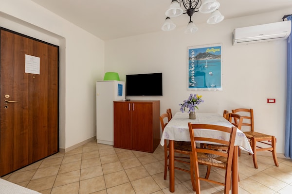 Foto van Een merrie van 150 meter, 2, aria condizionata - Vakantiehuis in Valledoria - DiningRoom