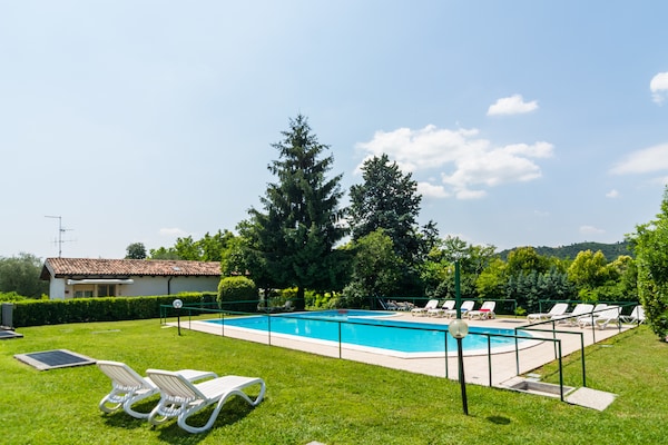 Foto van Appartement in Salò met zwembad en olijfgaard - Vakantiehuis in Cunettone - PoolOfHouse