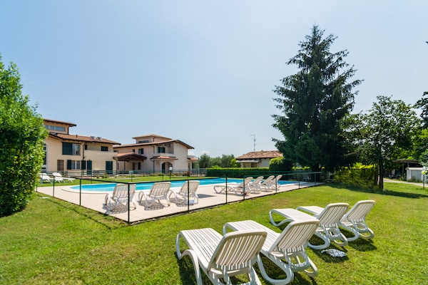 Foto van Modern Salo appartement met zwembad - Vakantiehuis in Cunettone - PoolOfHouse