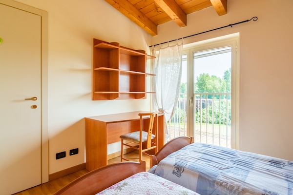 Foto van Modern Salo appartement met zwembad - Vakantiehuis in Cunettone - BedRoom