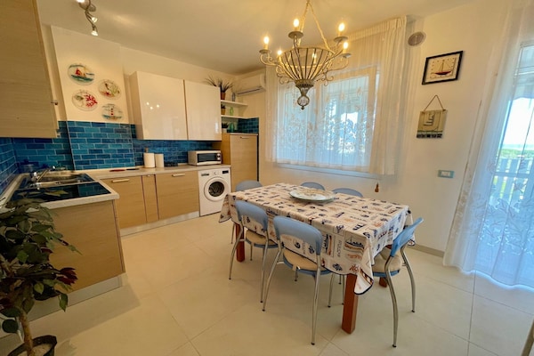 Foto van Appartement met zeezicht en zwembad in Caorle - Vakantiehuis in Caorle (VE) - Kitchen