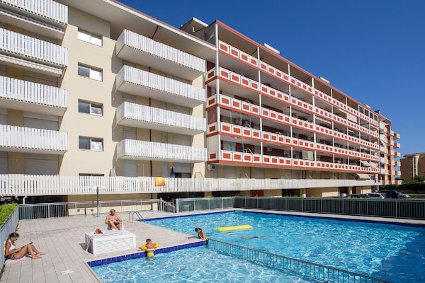 Foto van Appartement met zeezicht en zwembad in Caorle - Vakantiehuis in Caorle (VE) - ExteriorSummer