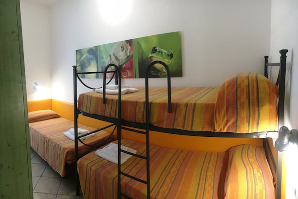 Foto van Resortappartement met zwembad - Vakantiehuis in Lido di Spina - BedRoom