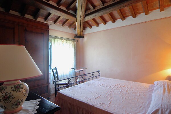 Foto van Villa in Cortona met Zwembad en Tuin - Vakantiehuis in Cortona - BedRoom