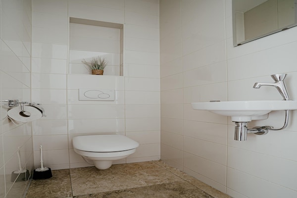 Foto van Appartement aan het Strand met Uitzicht - Vakantiehuis in Egmond aan zee - BathRoom